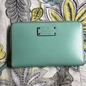 Kate Spade travel wallet in sea foam color